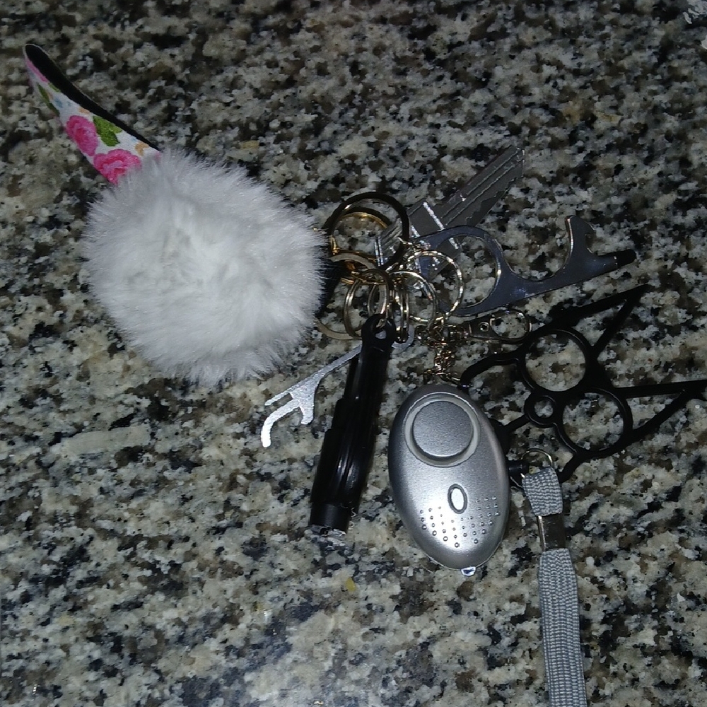 White Faux Fur Pom Pom Keychain with Silver Alarm